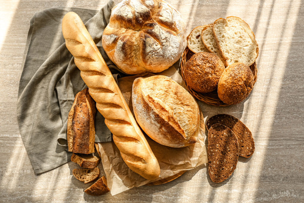 assortment of fresh bread on table
